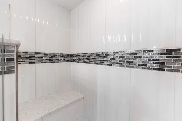 a view of a water heater and a room