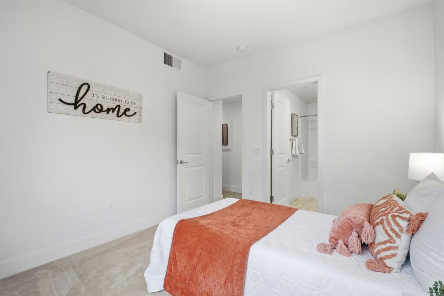 385 Line Street Hayward, CA 94544 - Photo 17 of 38 a bedroom with a bed and a couch