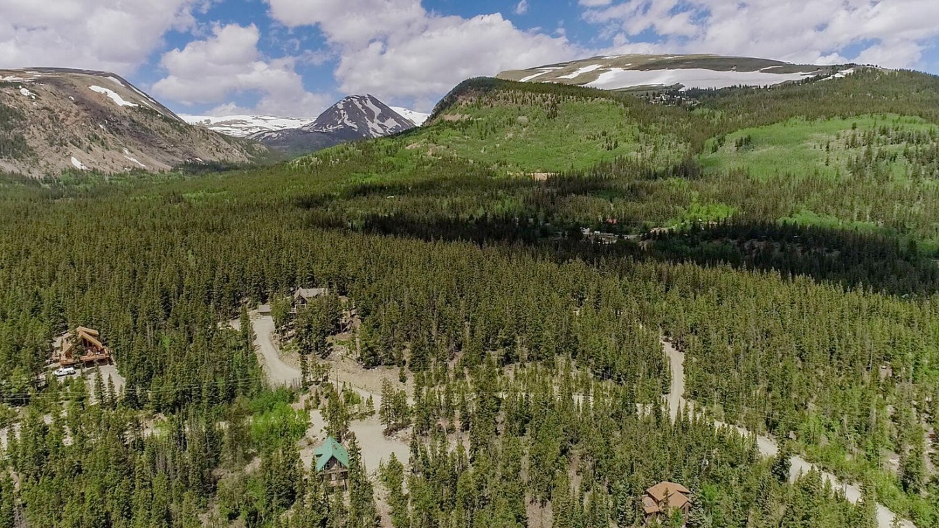 503 Golden Hills Road Alma, CO 80420 - Photo 15 of 36 a view of a lake in middle of the forest