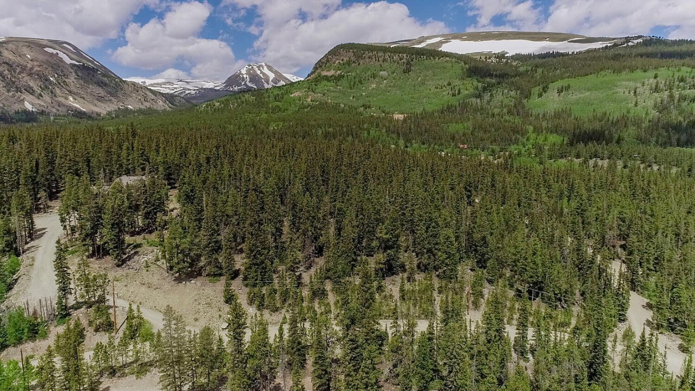 503 Golden Hills Road Alma, CO 80420 - Photo 17 of 36 a view of a lake in middle of the forest