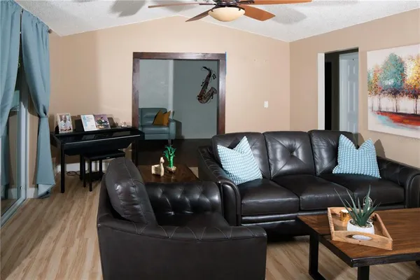 a living room with furniture and a couch