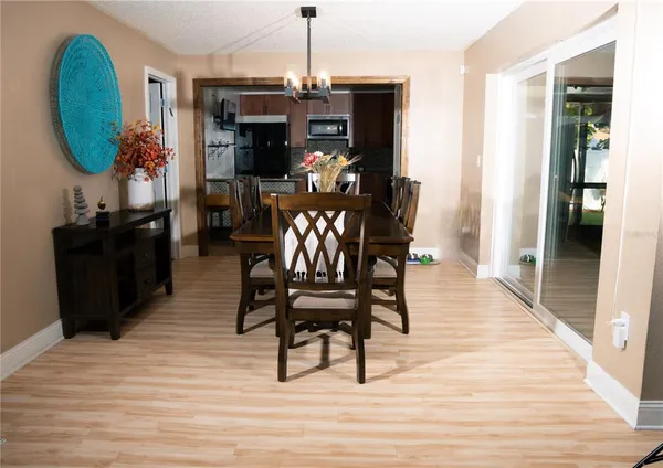 a view of a livingroom with furniture and a fireplace