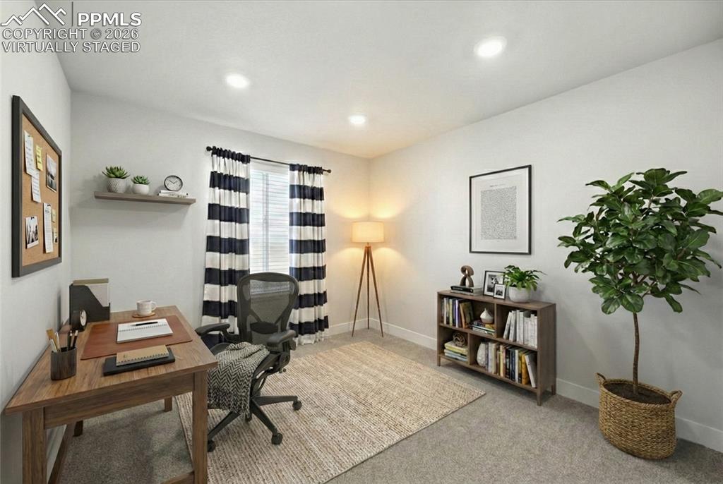 9891 Hidden Ranch Court Peyton, CO 80831 - Photo 26 of 44 a view of a workspace with furniture