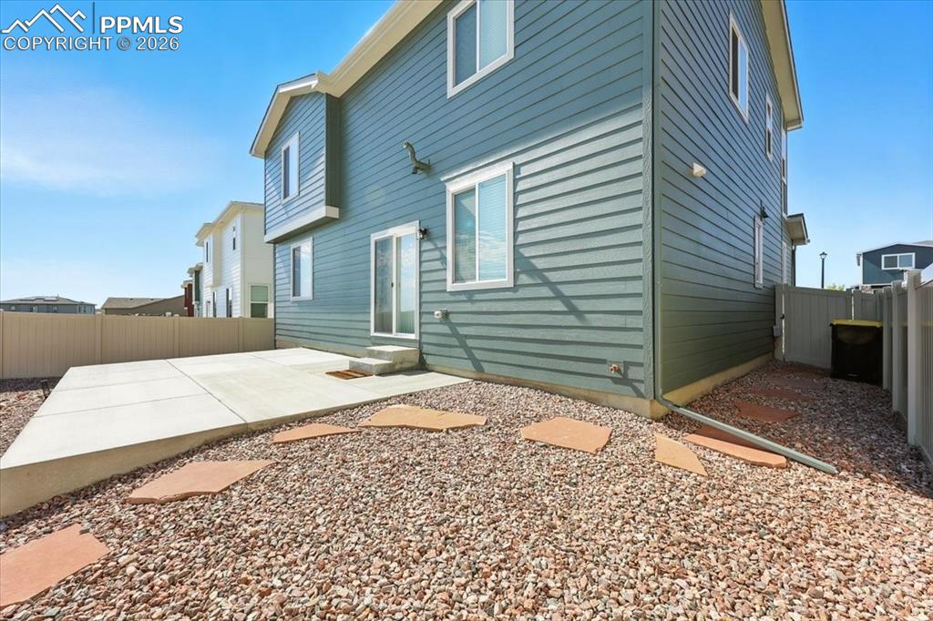 9891 Hidden Ranch Court Peyton, CO 80831 - Photo 41 of 44 a pathway of a house with a yard