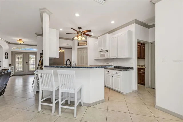 $420,000 | 13361 Southwest Pembroke Circle North, Lake Suzy, FL 34269