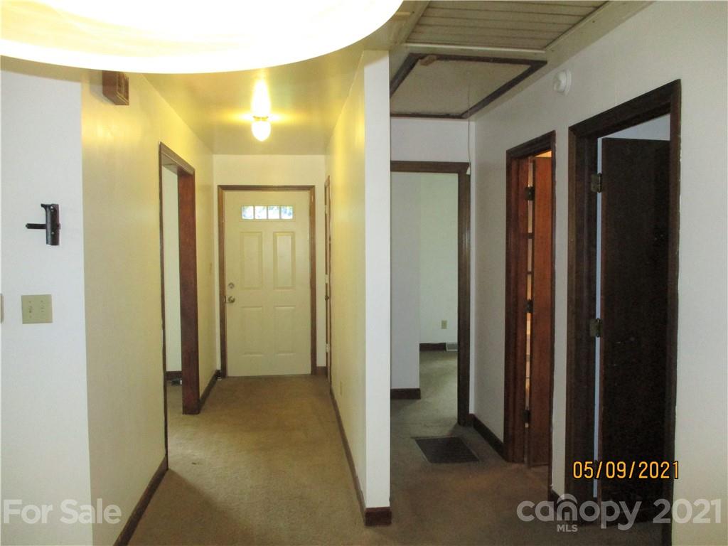 1287 Potter Road Lancaster, SC 29720 - Photo 2 of 25 a view of a bathroom from a hallway