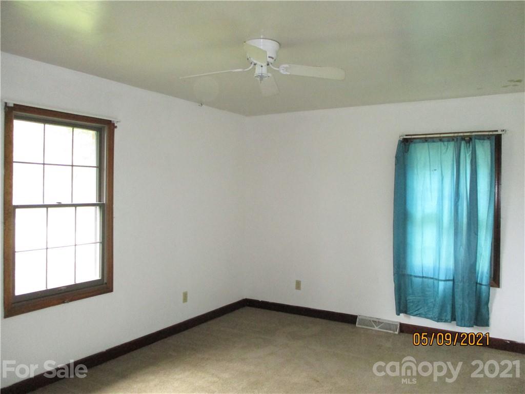 1287 Potter Road Lancaster, SC 29720 - Photo 18 of 25 an empty room with windows
