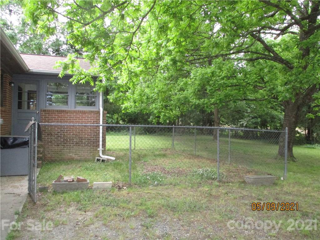 1287 Potter Road Lancaster, SC 29720 - Photo 21 of 25 a backyard of a house with lots of green space