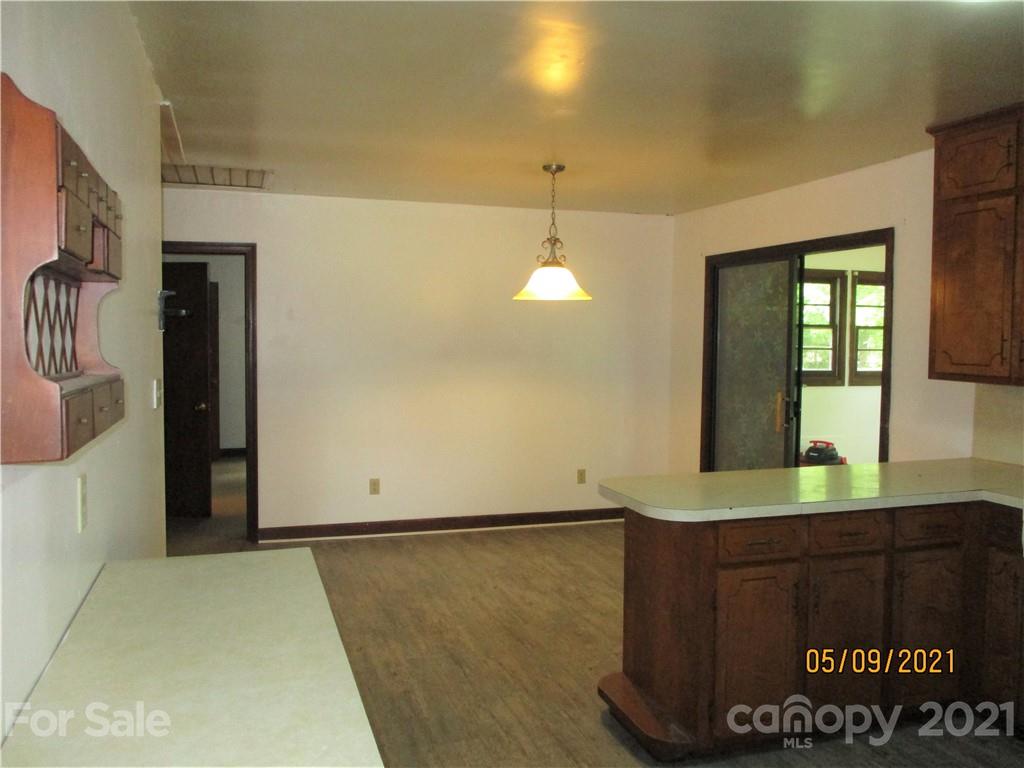 1287 Potter Road Lancaster, SC 29720 - Photo 4 of 25 a view of a room with wooden floor and staircase