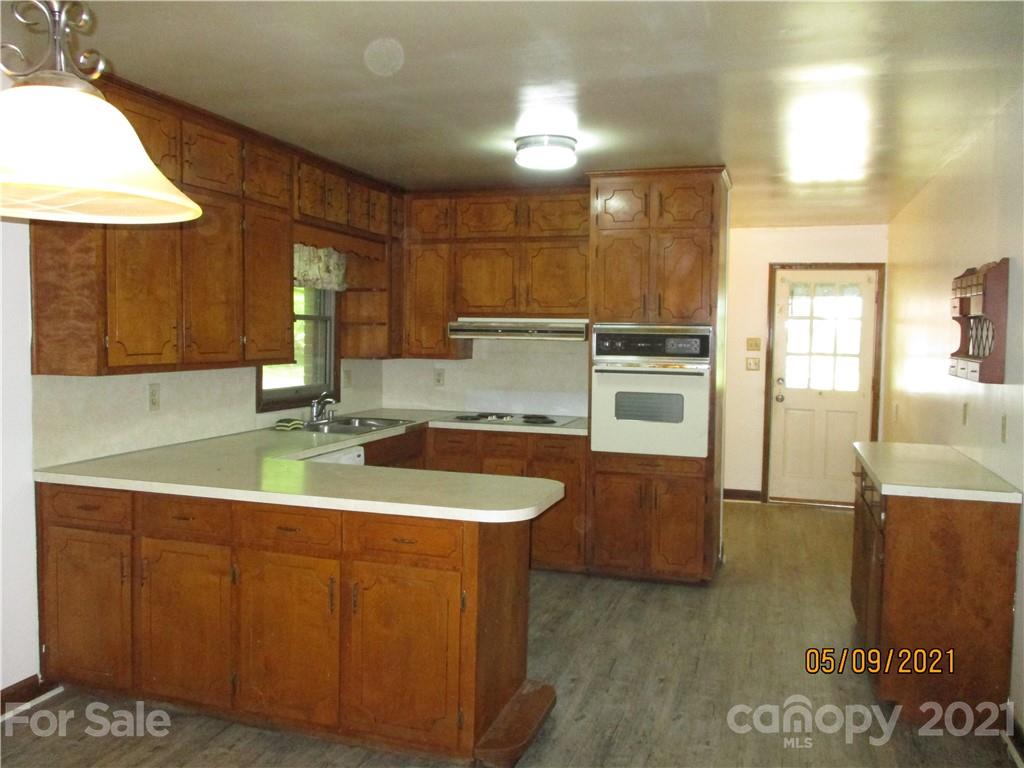 1287 Potter Road Lancaster, SC 29720 - Photo 6 of 25 a kitchen with a sink and cabinets
