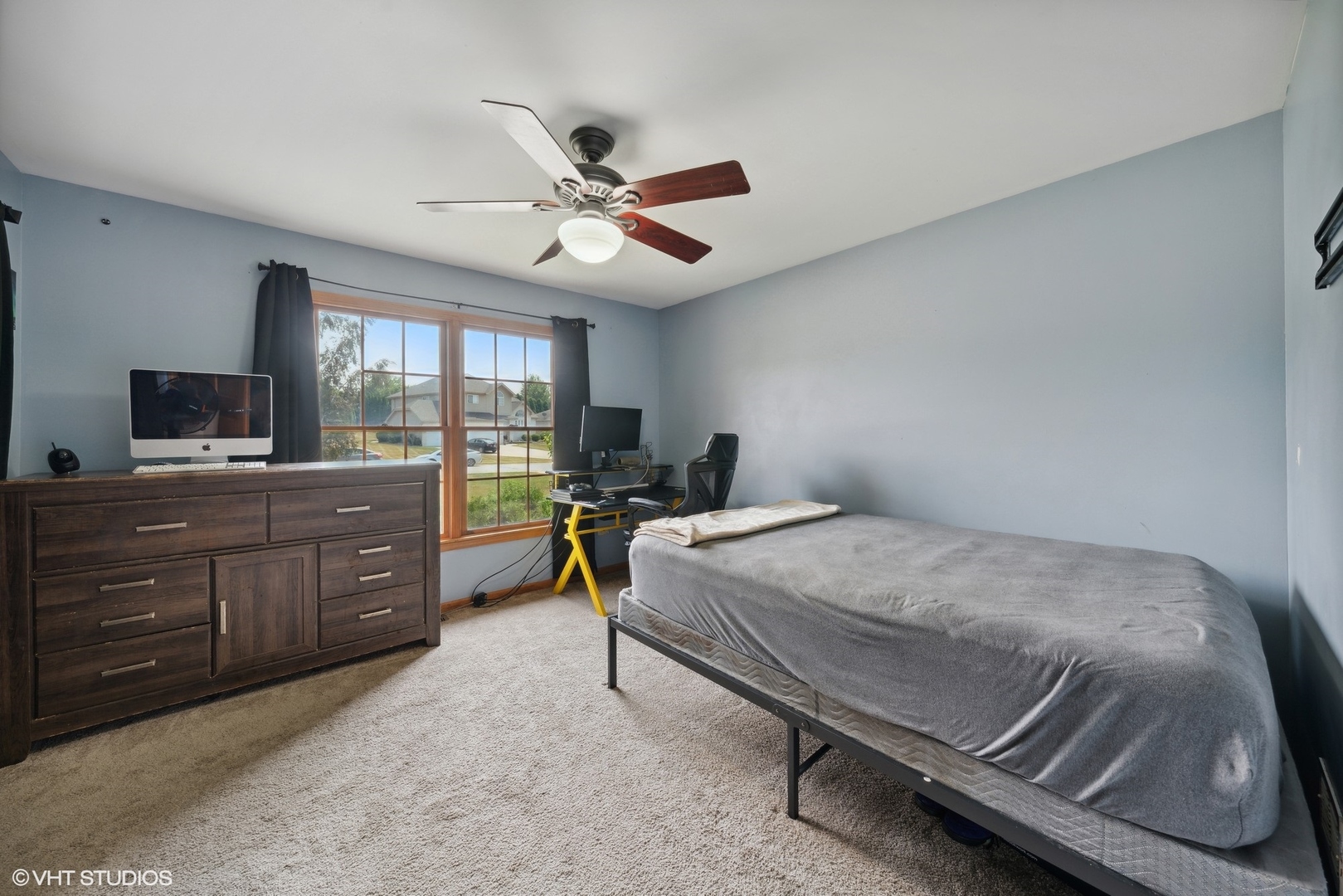 331 Coventry Lane Crete, IL 60417 - Photo 13 of 19 a bedroom with a bed and wooden floor