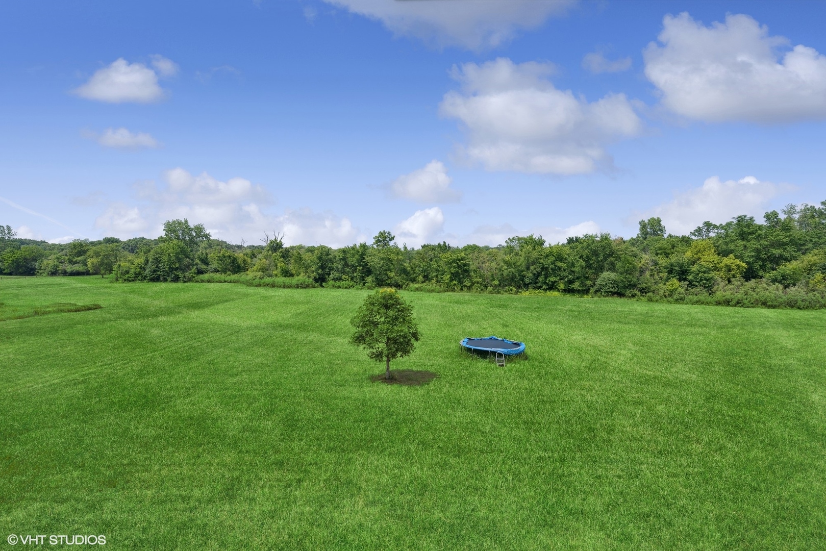 331 Coventry Lane Crete, IL 60417 - Photo 16 of 19 a view of outdoor space with green field and trees