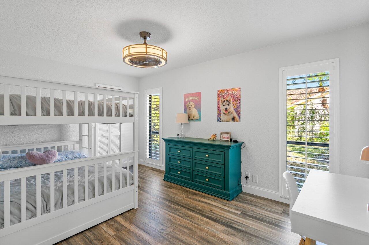 10374 Canoe Brook Circle Boca Raton, FL 33498 - Photo 19 of 41 a room with furniture and a window