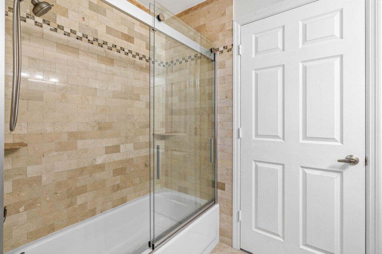 10374 Canoe Brook Circle Boca Raton, FL 33498 - Photo 21 of 41 a bathroom with a shower
