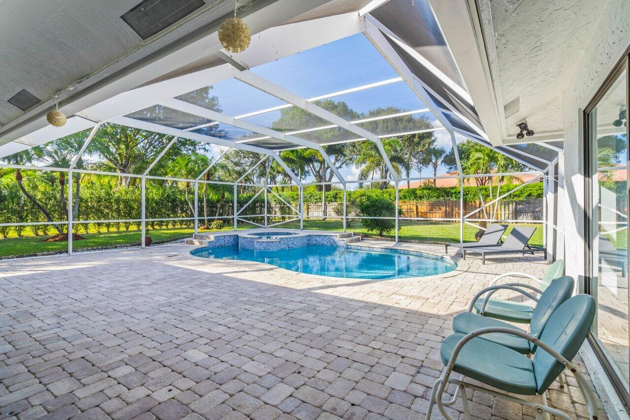 10374 Canoe Brook Circle Boca Raton, FL 33498 - Photo 29 of 41 swimming pool view with seating space