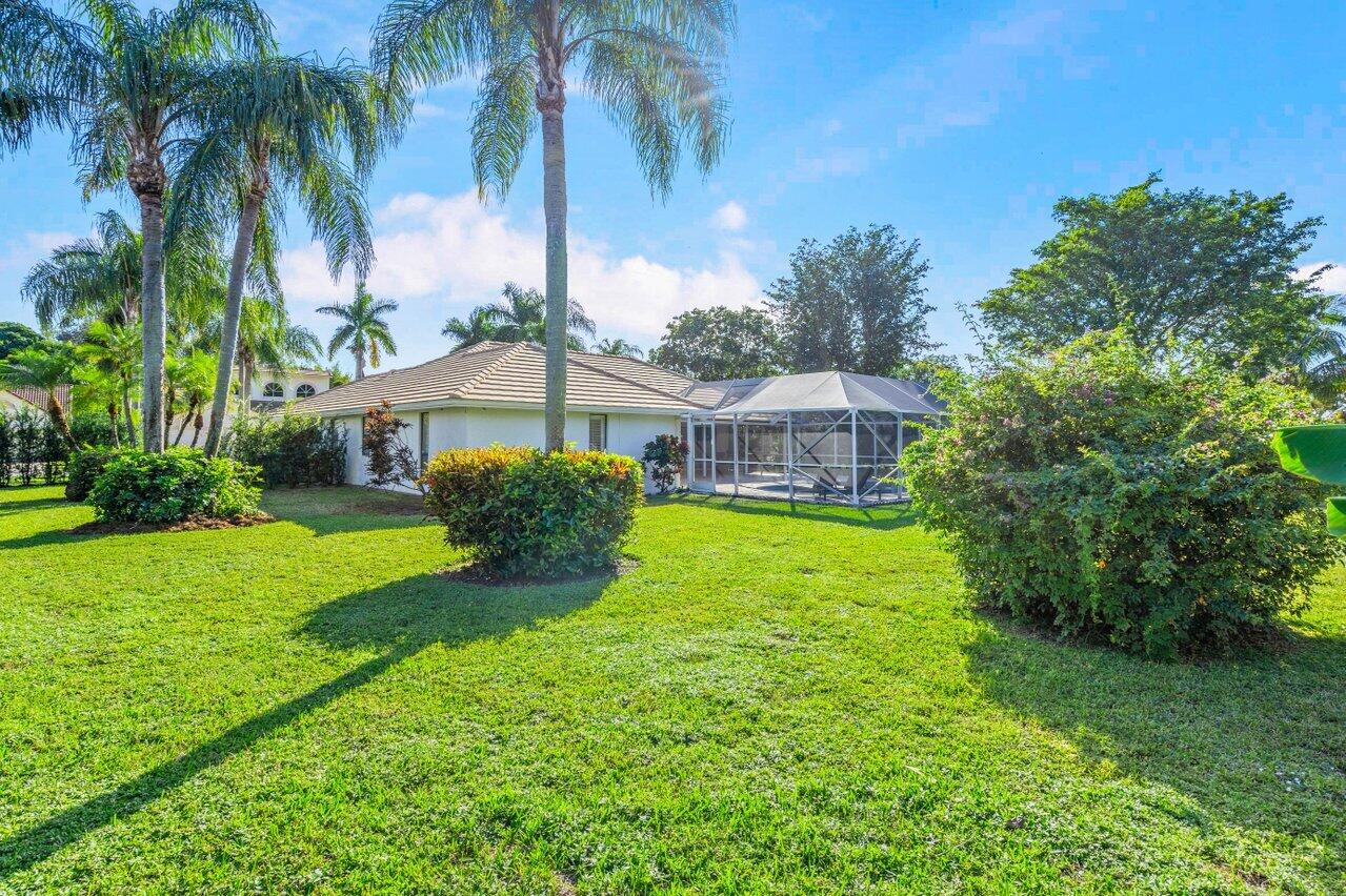 10374 Canoe Brook Circle Boca Raton, FL 33498 - Photo 31 of 41 a front view of house with yard and green space