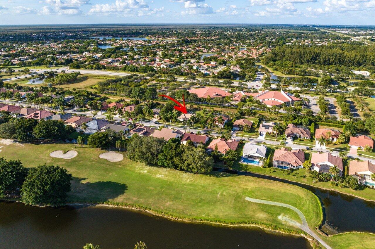10374 Canoe Brook Circle Boca Raton, FL 33498 - Photo 38 of 41 a view of a lake with a city