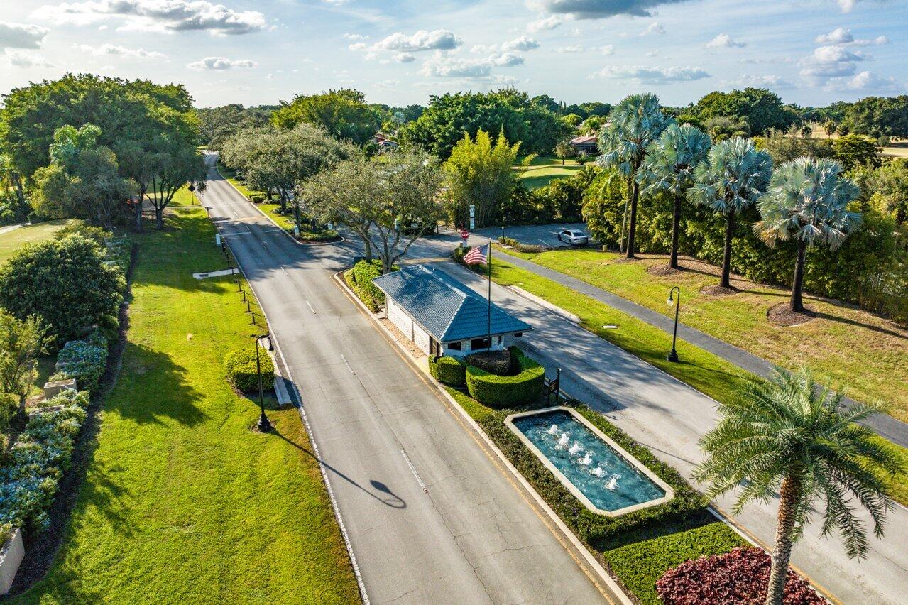 10374 Canoe Brook Circle Boca Raton, FL 33498 - Photo 39 of 41 a view of a swimming pool with a patio