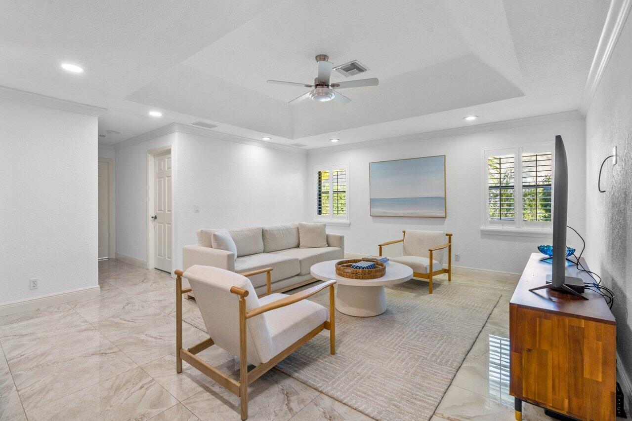 10374 Canoe Brook Circle Boca Raton, FL 33498 - Photo 8 of 41 a living room with furniture