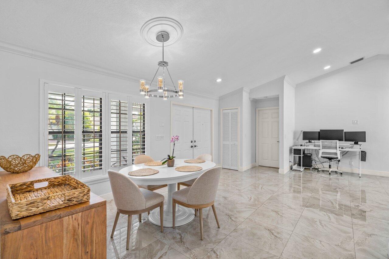 10374 Canoe Brook Circle Boca Raton, FL 33498 - Photo 9 of 41 a view of a dining room with furniture window and outside view