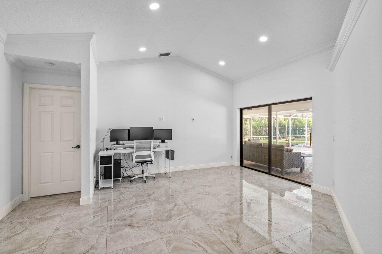 10374 Canoe Brook Circle Boca Raton, FL 33498 - Photo 10 of 41 a view of work space with wooden floor and furniture