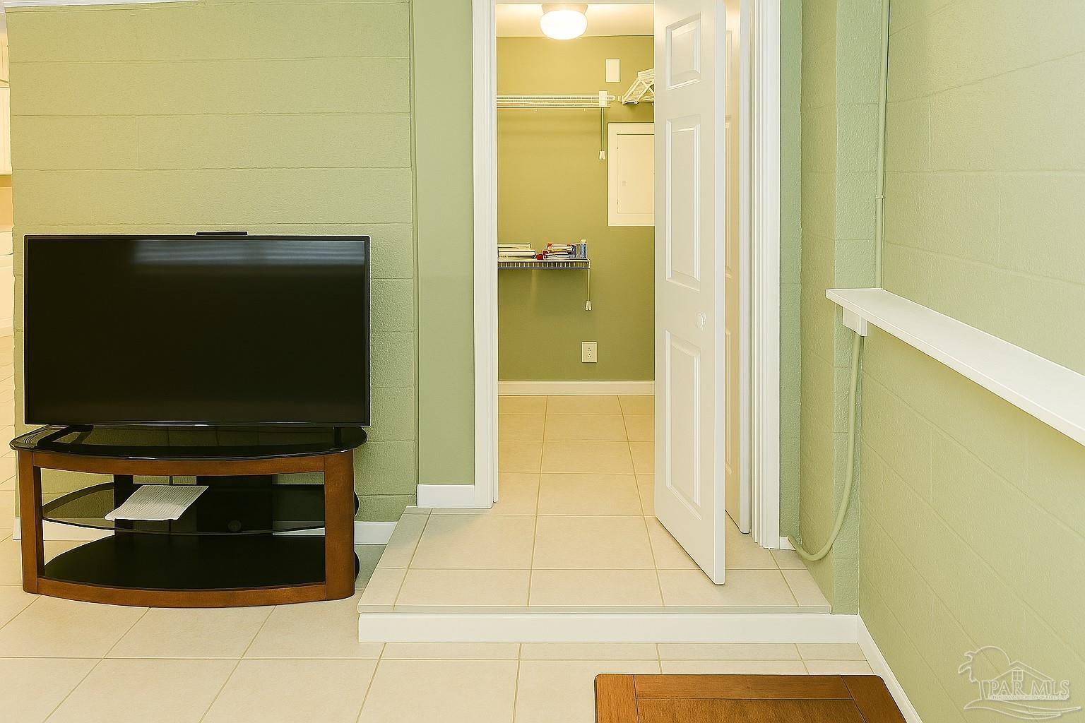 6274 Munson Highway Milton, FL 32570 - Photo 24 of 26 a bathroom with a bathtub and a shower