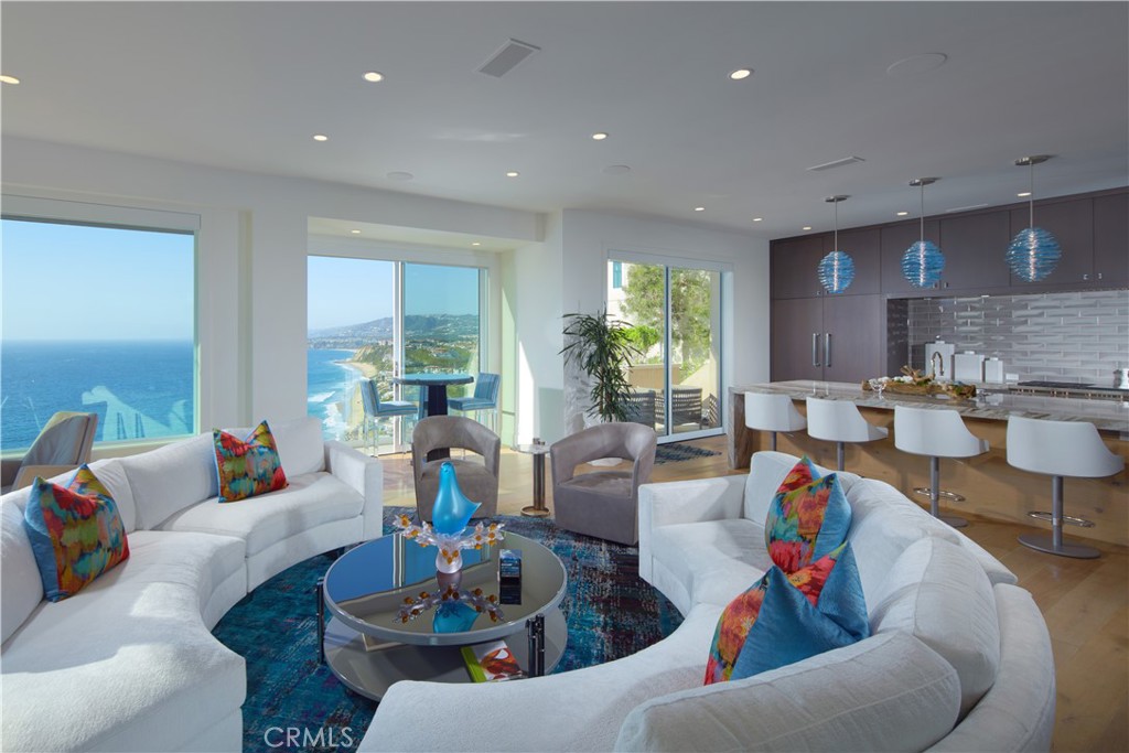 34385 Dana Strand Road, Unit B Dana Point, CA 92629 - Photo 6 of 45 a living room with furniture and a wooden floor