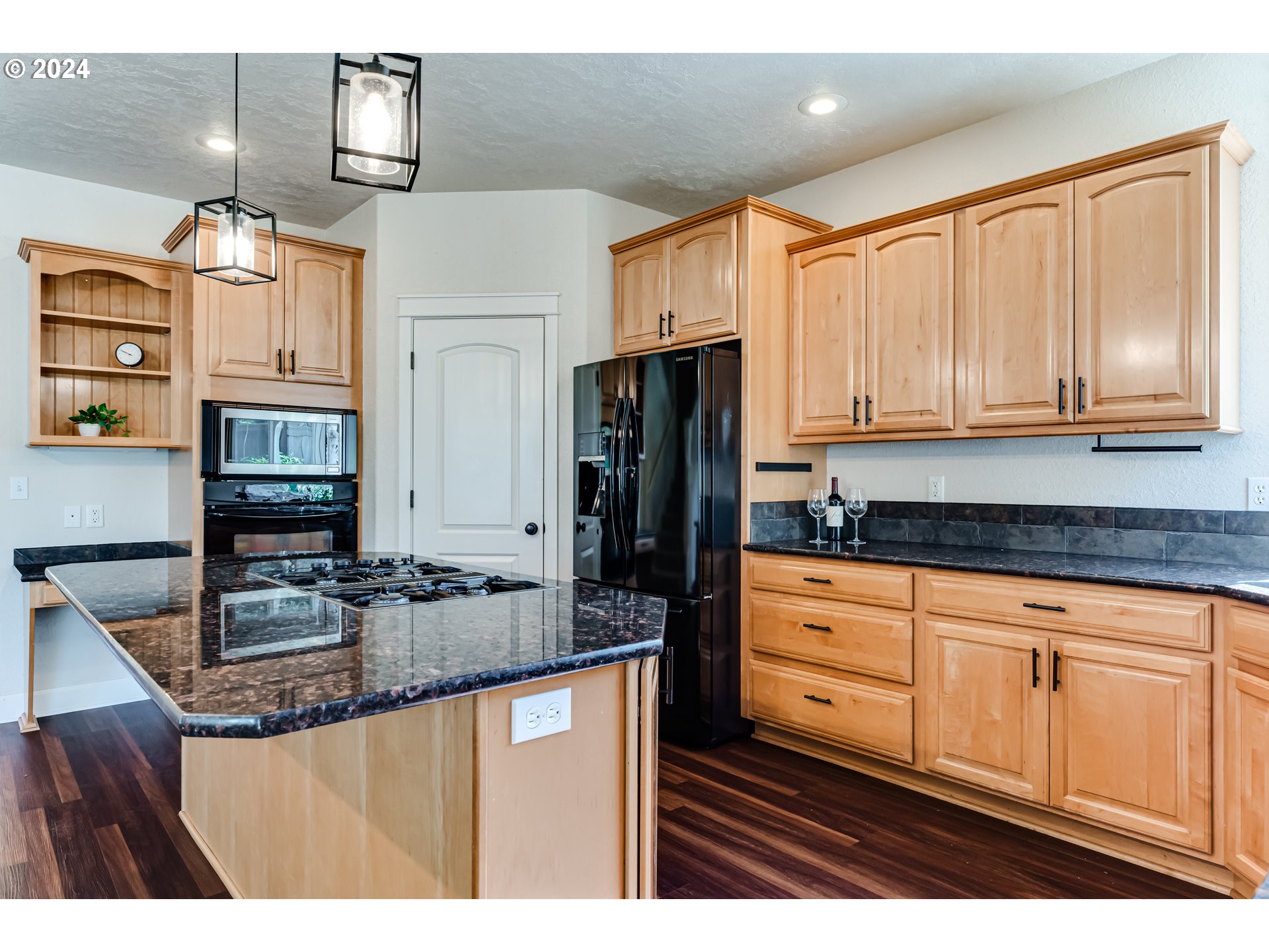 3313 Falcon Drive Springfield, OR 97477 - Photo 11 of 36 a kitchen with stainless steel appliances granite countertop a sink stove and refrigerator