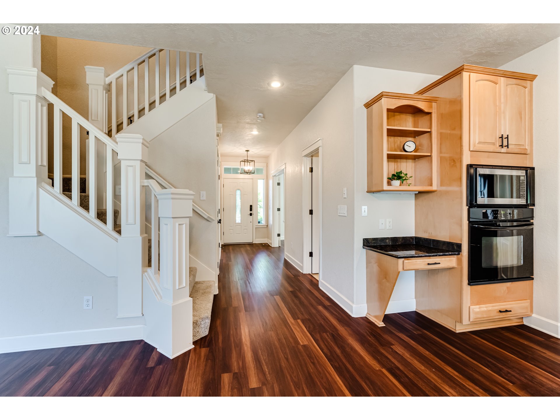 3313 Falcon Drive Springfield, OR 97477 - Photo 12 of 36 a open kitchen with wooden floor and stainless steel appliances