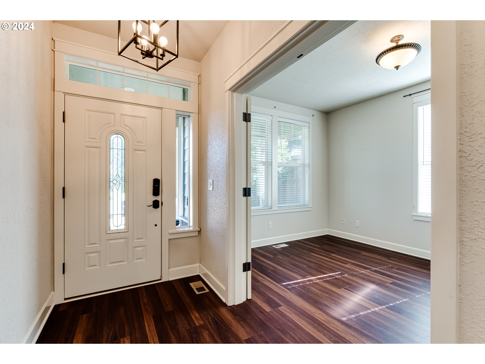 3313 Falcon Drive Springfield, OR 97477 - Photo 3 of 36 a view of an entryway with wooden floor
