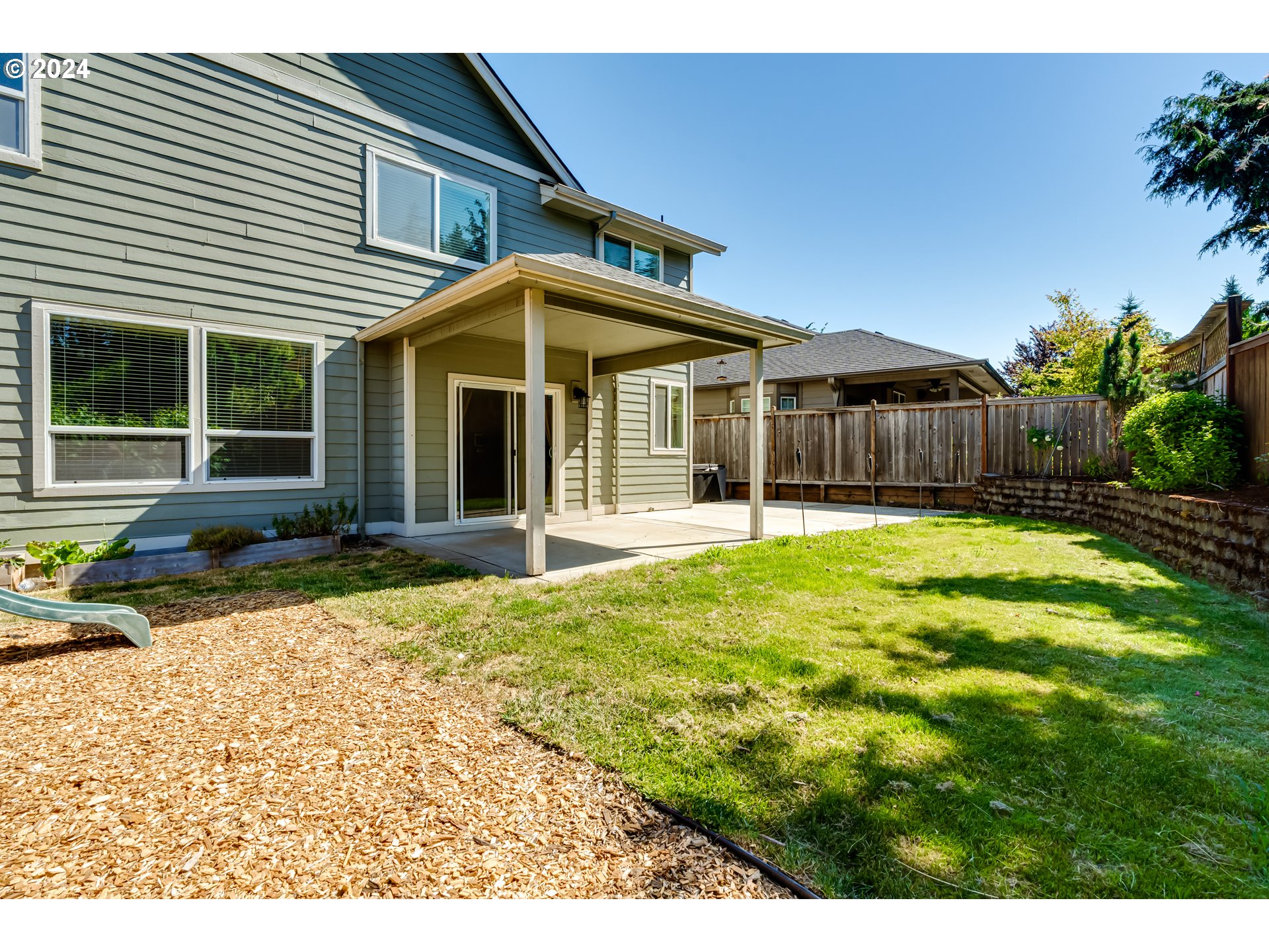 3313 Falcon Drive Springfield, OR 97477 - Photo 34 of 36 a front view of a house with a yard