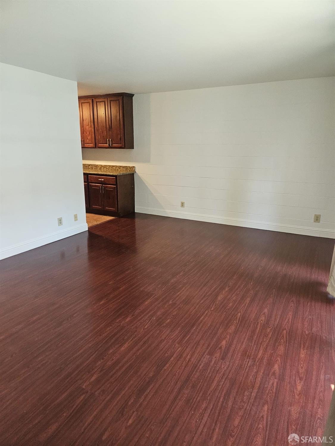 75 Western Shore Lane, Unit 1 San Francisco, CA 94115 - Photo 12 of 16 a view of an empty room and wooden floor