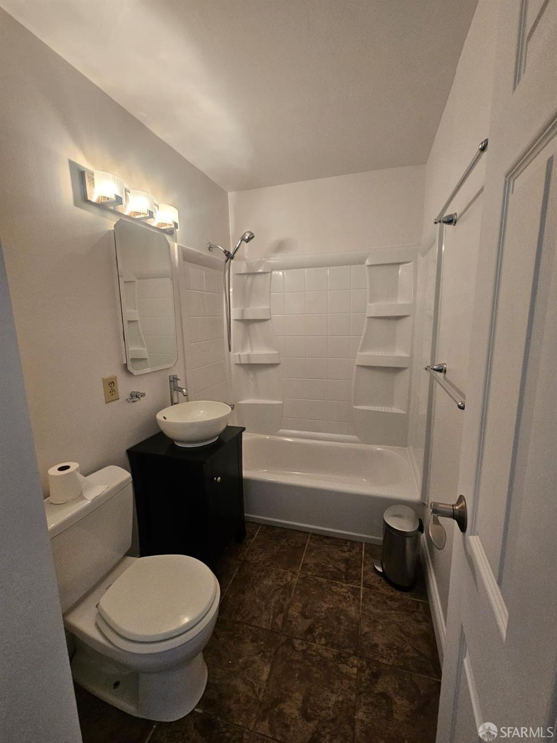 75 Western Shore Lane, Unit 1 San Francisco, CA 94115 - Photo 15 of 16 a bathroom with a sink toilet and shower