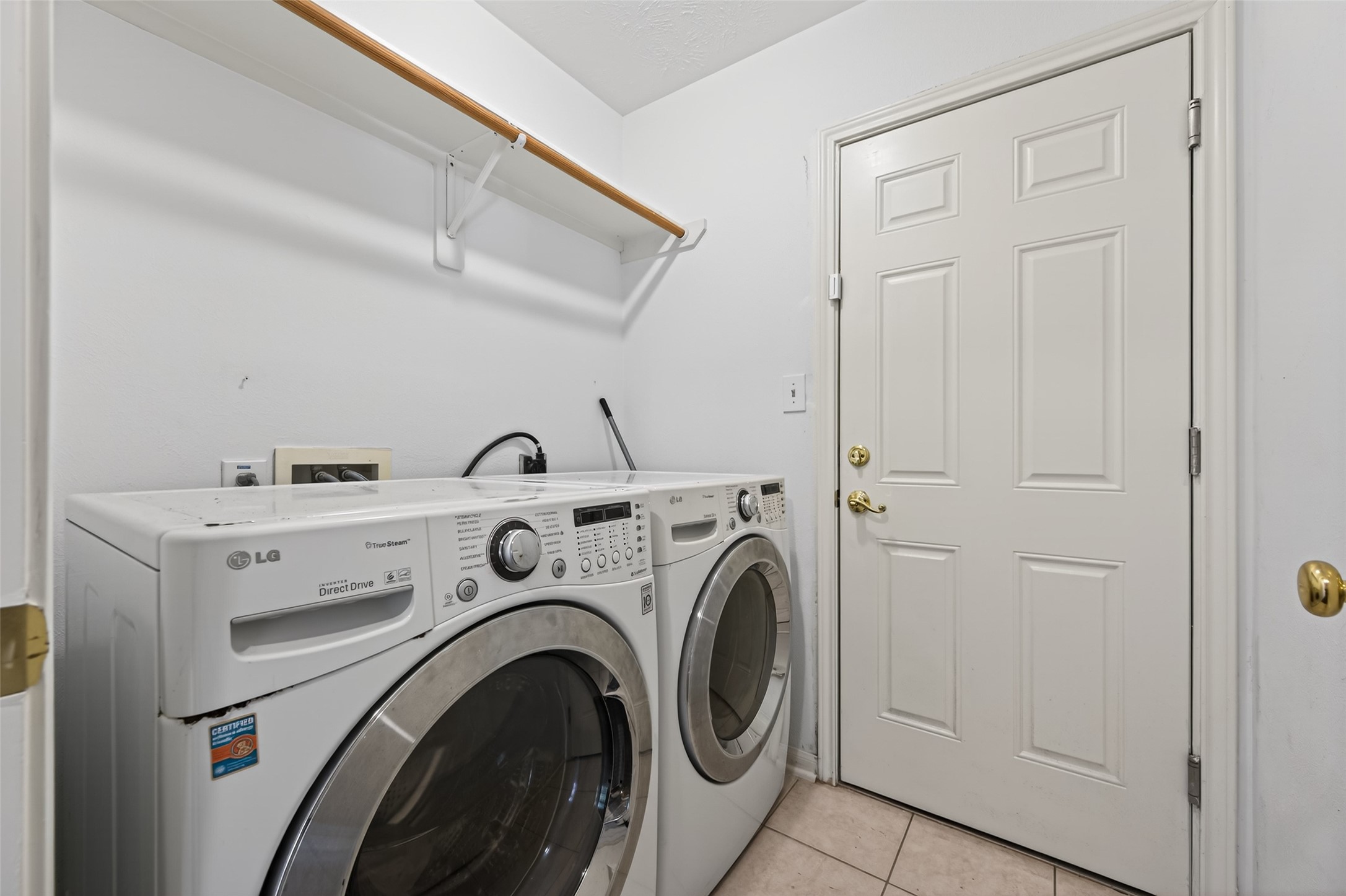 39 North Delta Mill Circle Conroe, TX 77385 - Photo 18 of 35 a utility room with dryer and washer