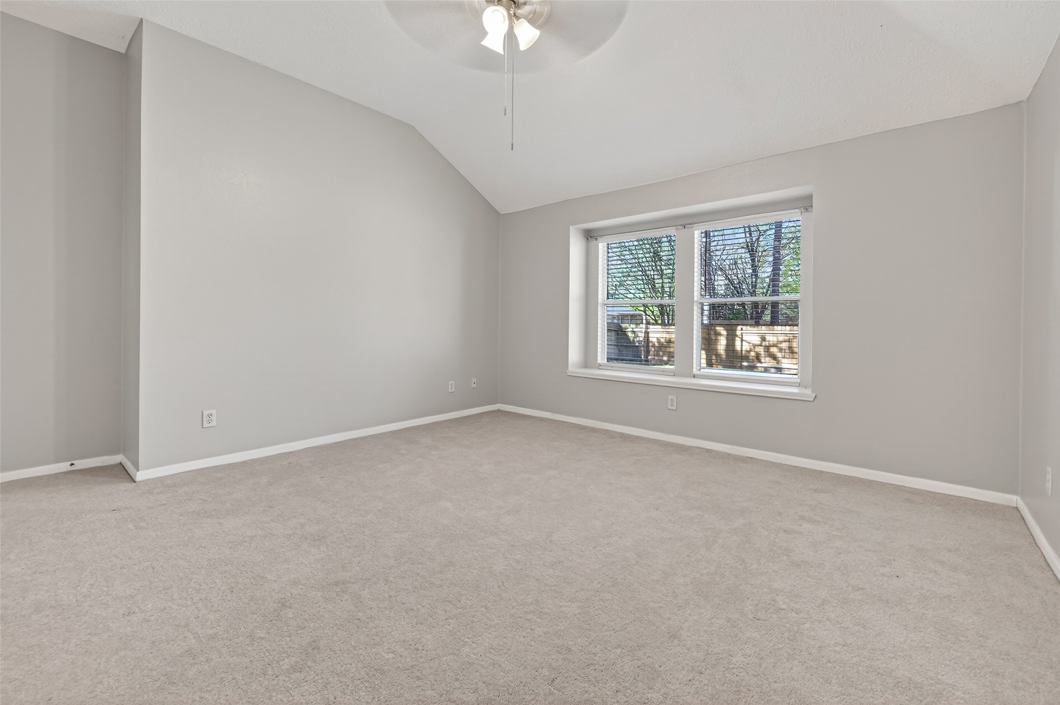 39 North Delta Mill Circle Conroe, TX 77385 - Photo 21 of 35 an empty room with a window