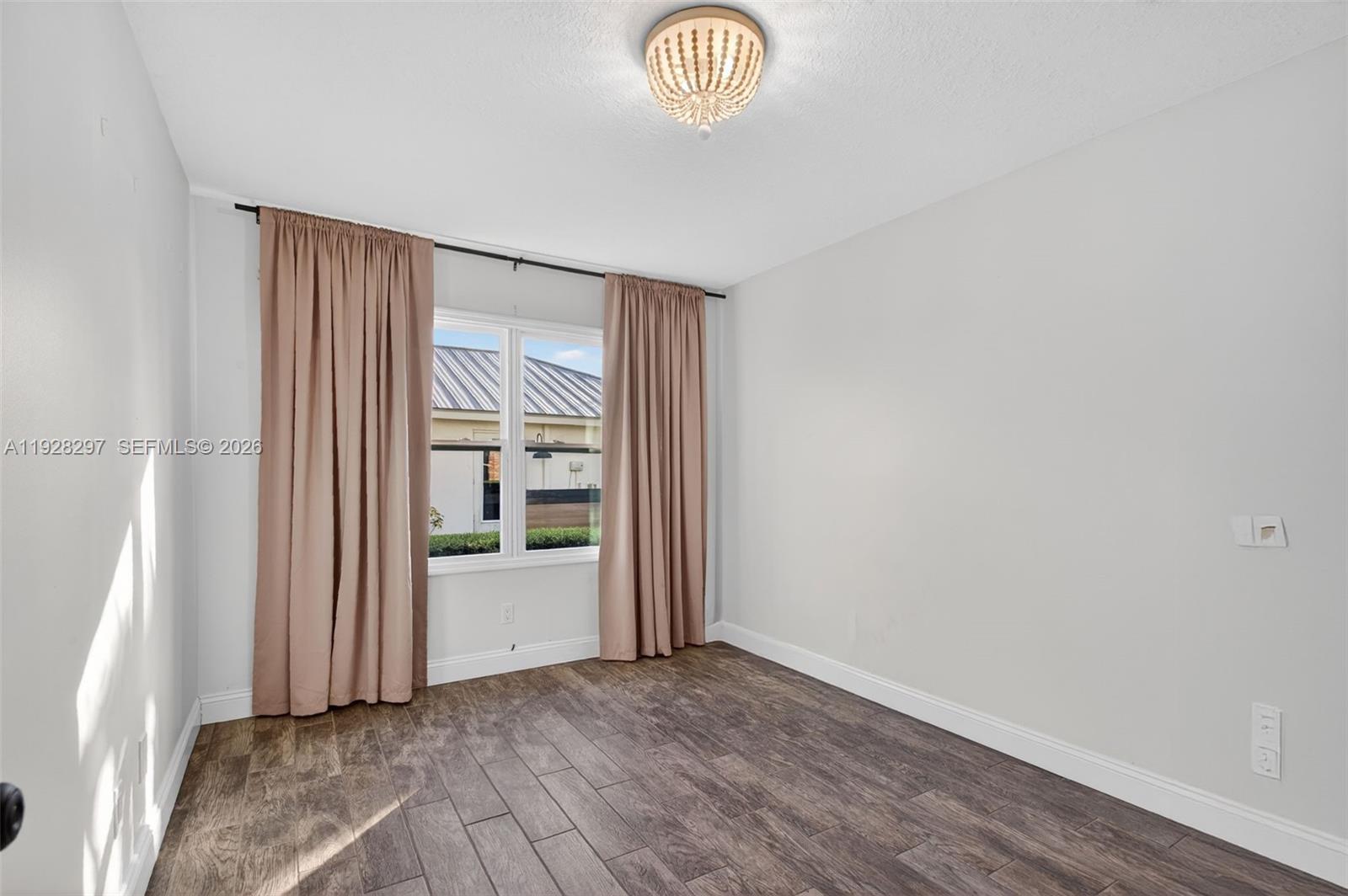 3804 Southeast Fairway West Stuart, FL 34997 - Photo 14 of 47 Second bedroom