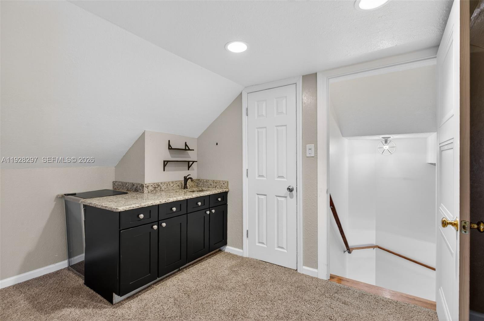 3804 Southeast Fairway West Stuart, FL 34997 - Photo 32 of 47 Bonus room upstairs- wet bar