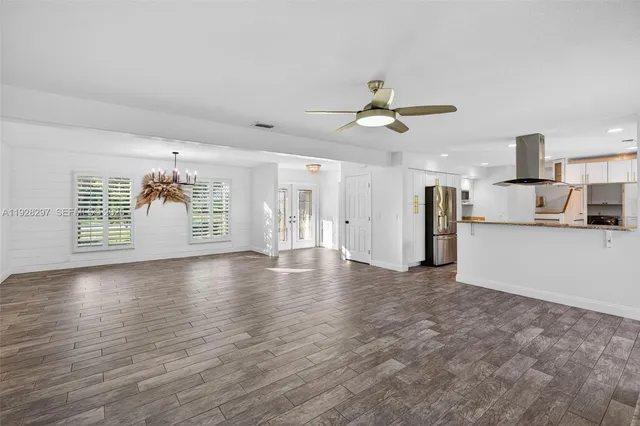a view of a dining table and chairs in a room