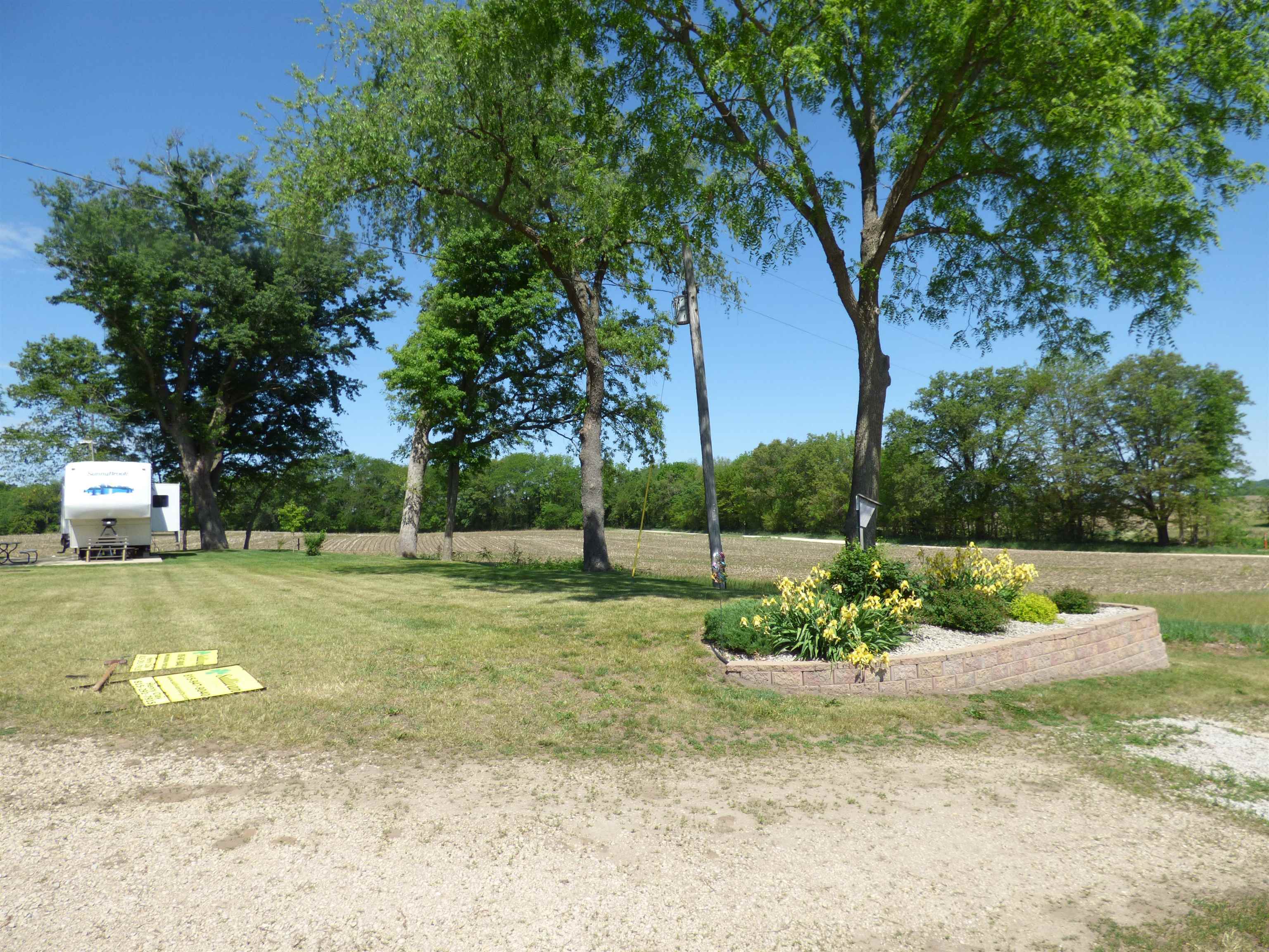 6384 A Diehl Road Savanna, IL 61074 - Photo 21 of 32 a view of a garden with a tree