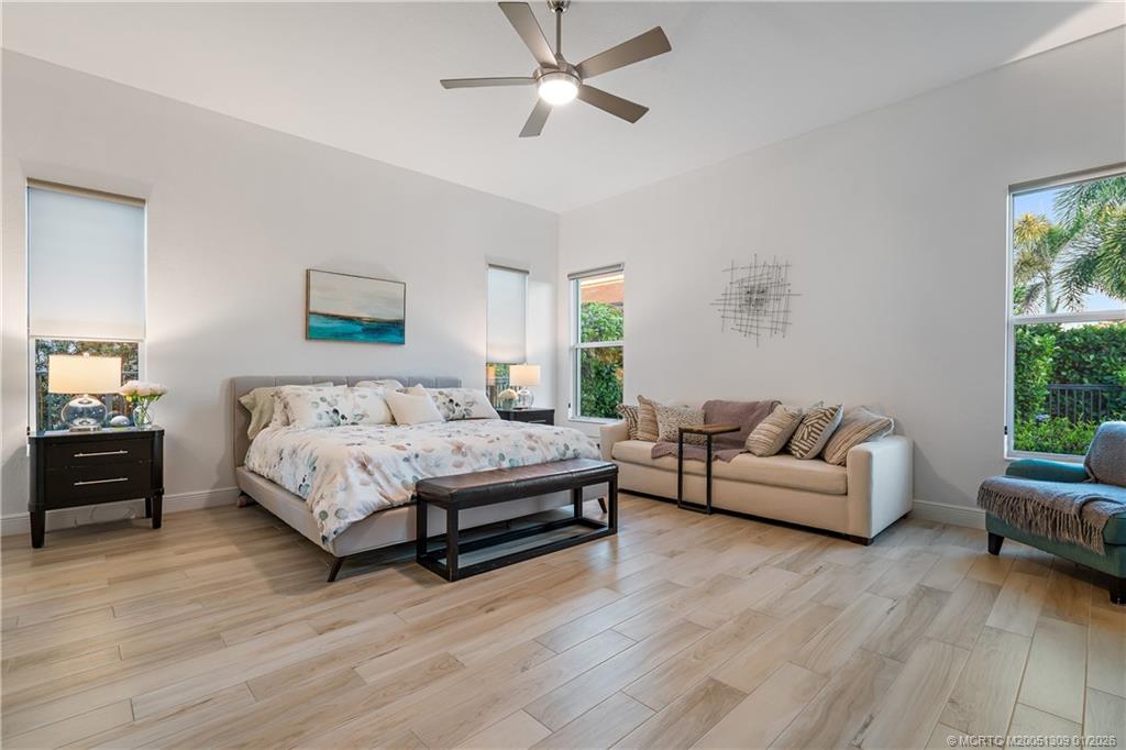 4713 Southwest Briarwood Court Stuart, FL 34997 - Photo 24 of 57 Spacious Primary Bedroom at back of home