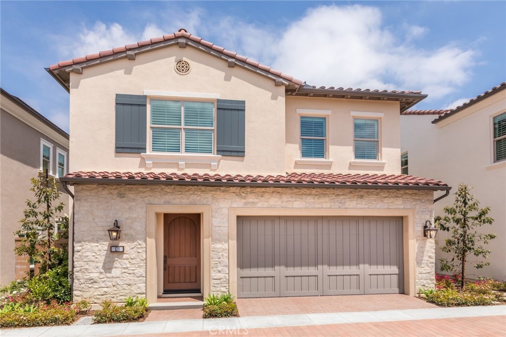 102 EVERSEDGE Irvine, CA 92618 - Photo 7 of 8 a front view of a house
