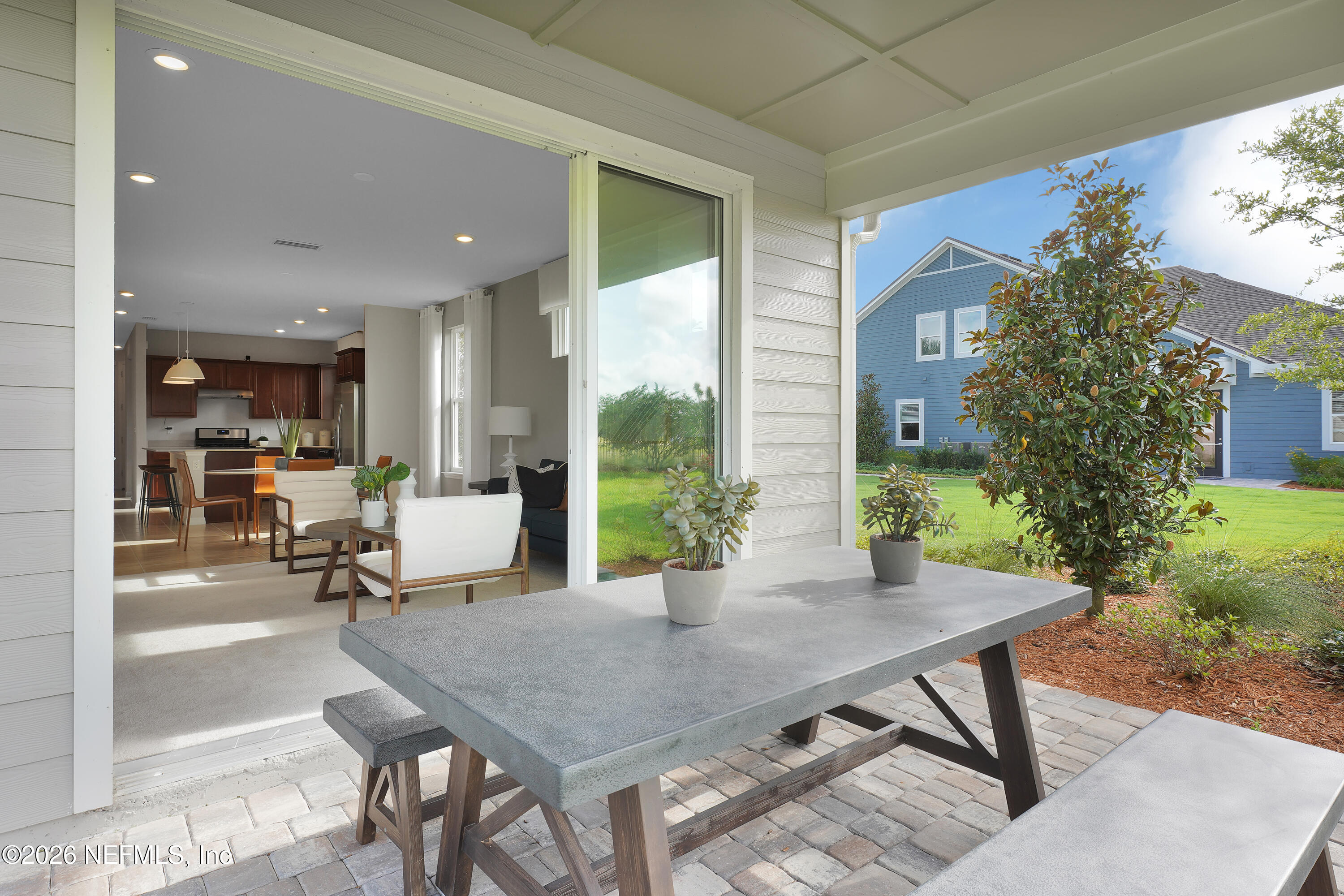 685 Continuum Loop Yulee, FL 32097 - Photo 16 of 38 Contour Covered Lanai