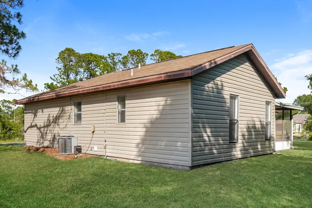 a view of a backyard with plants