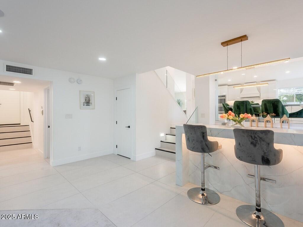 4748 East Redfield Road Phoenix, AZ 85032 - Photo 15 of 73 015_Eatup Bar Seating