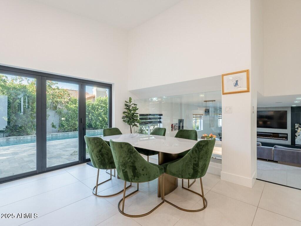 4748 East Redfield Road Phoenix, AZ 85032 - Photo 18 of 73 a view of a dining room with furniture window and outside view