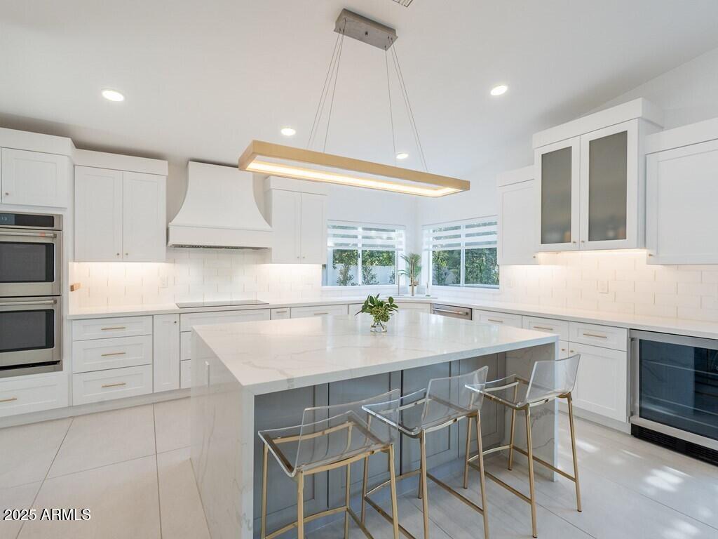 4748 East Redfield Road Phoenix, AZ 85032 - Photo 20 of 73 a kitchen with a sink cabinets and window