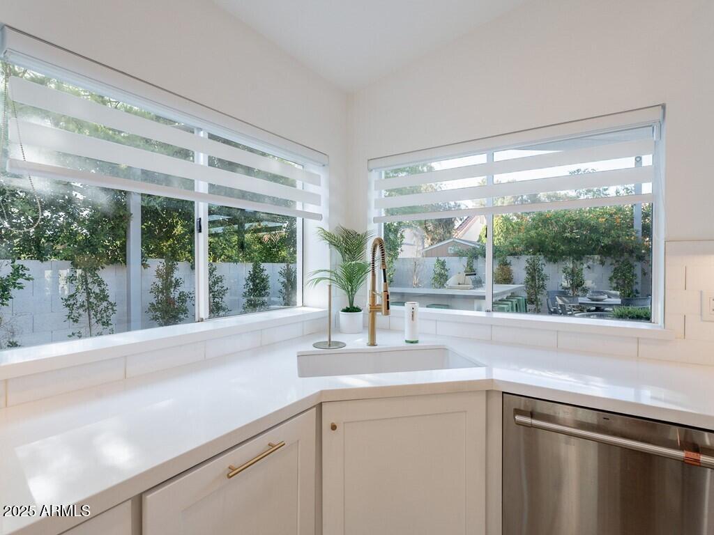 4748 East Redfield Road Phoenix, AZ 85032 - Photo 24 of 73 a view of a sink and a large mirror