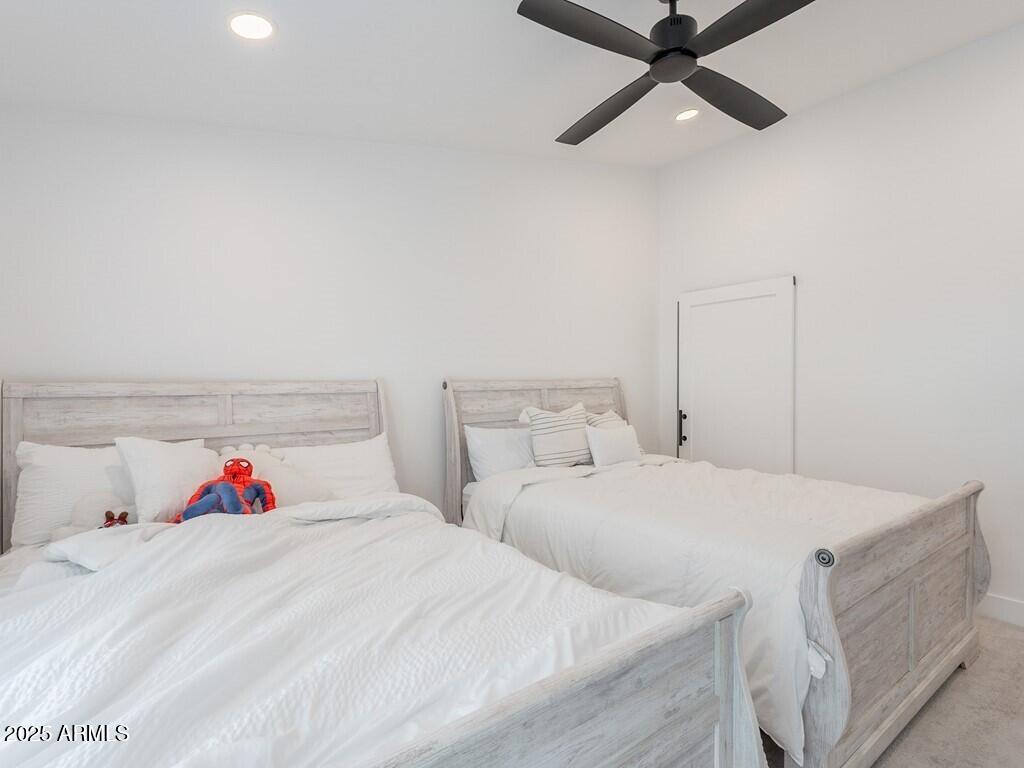 4748 East Redfield Road Phoenix, AZ 85032 - Photo 37 of 73 a bedroom with a bed and a closet