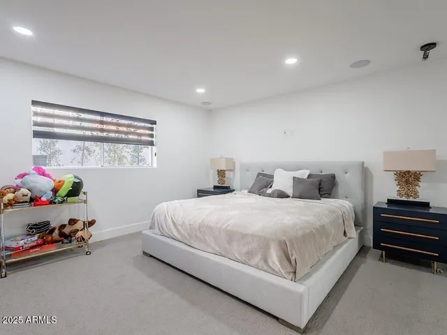 a view of backyard with seating area and green space