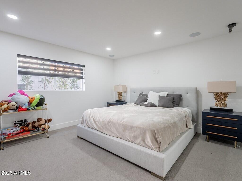 4748 East Redfield Road Phoenix, AZ 85032 - Photo 39 of 73 a bedroom with a bed and a window